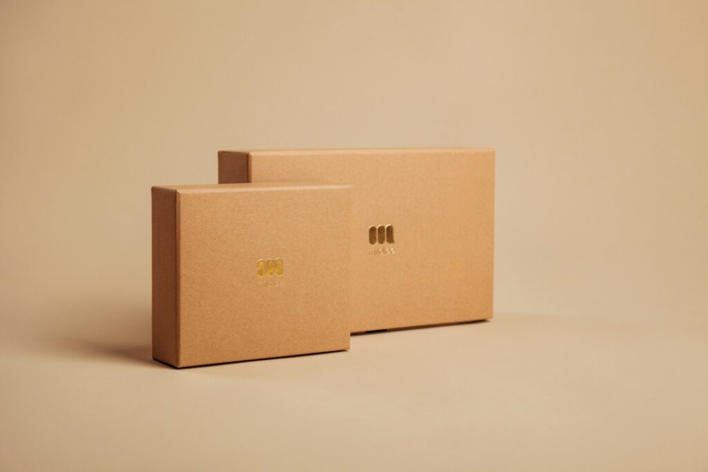 create your first digital product brown cardboard box on white table